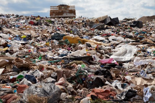 Workers segregating demolition waste materials